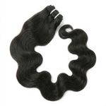 Black hair extensions with wavy texture on a white background