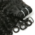 Three bundles of black loose wave hair extensions on a white background